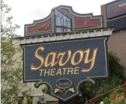 Savoy Theatre sign at new entrance. Note the picture of the “old” entrance at the top of the sign.