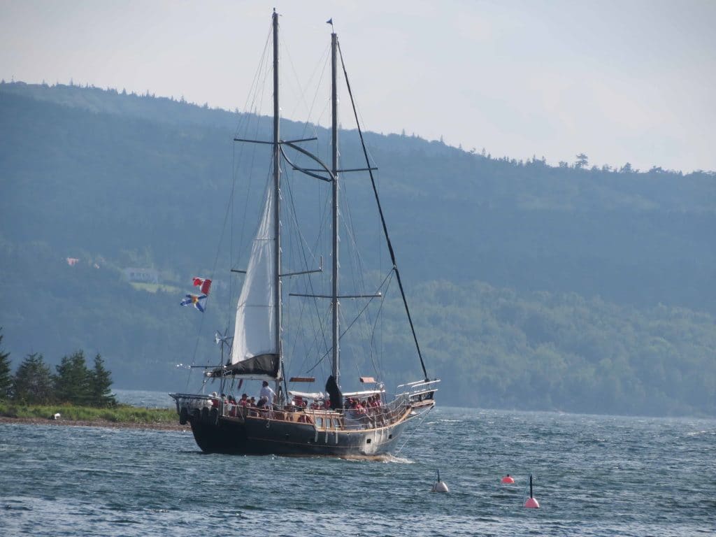 The Amoeba schooner sailing on the Bras d'Or Lake. Baddeck